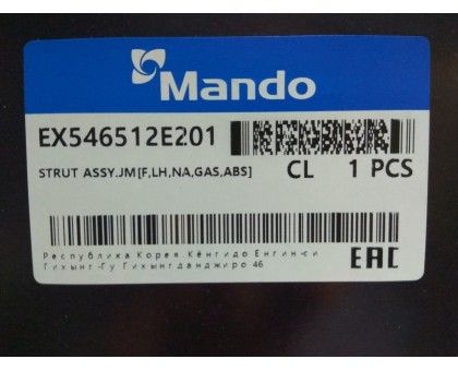 Передний левый газомасляный амортизатор Mando (EX546512E201) на Hyundai Tucson I (2004-2016)