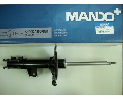 Передний правый газомасляный амортизатор Mando (EX546612H000) на Hyundai Elantra II (HD 2006-2011)