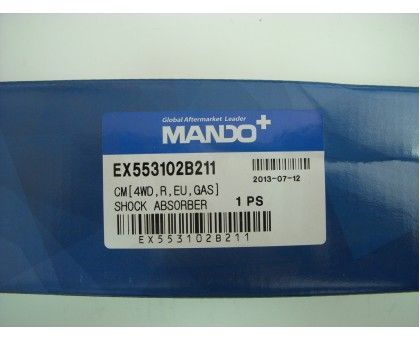 Задний газомасляный амортизатор Mando (EX553102B211) на Hyundai Santa Fe II (2006-)