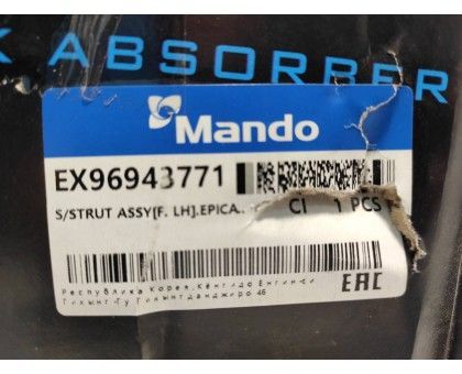 Передний левый газомасляный амортизатор Mando (EX96943771) на Chevrolet Epica